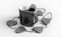 Heart shaped coffee mug dived in coffee beans, Valentines day. feb 2, 2015
