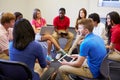 High School Students Taking Part In Group Discussi