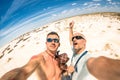 Hipster best  friends taking a selfie at Etosha national park