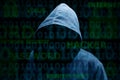 Hooded Silhouette Of A Hacker