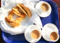 Indian snacks with cups of tea. Royalty Free Stock Photography