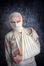 Injured Man with Head Bandages