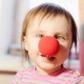 Kid with red nose