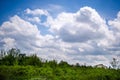 Landscape With Clouds On Blue ...