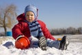 Little boy plays snow
