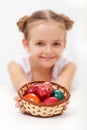 Little Girl Holding A Basket W...