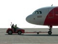 Malaysia. Plane being pushed off Gate