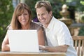 Man & Woman Couple Using Lapto...