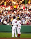 Manny Ramirez and David Ortiz stand for the National Anthem.