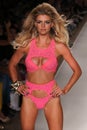 MIAMI - JULY 18: Model Kelly Rohrbach walks runway at Beach Bunny Swim collection