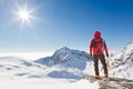 Mountaineer Looking At A Snowy...