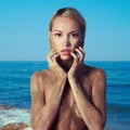 Nude blonde at the sea