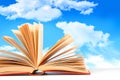 Open Book Against A Blue Sky