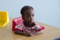 An orphan girl in Haiti school