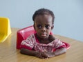 An orphan girl in Haiti school