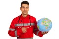 Paramedic pointing to earth globe