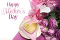 Pink theme breakfast with heart shaped toast, roses and polka dot gift with Happy Mothers Day sample text