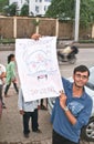 A protester with his anti-corruption placard Stock Photo