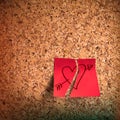 Red sticky note with heart sketched on cork board vector eps image Royalty Free Stock Images