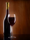 Red Wine Glass And Bottle On A...