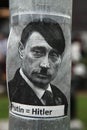 Russian president Vladimir Putin depicted as Adolf Hitler