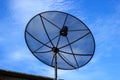Satellite dish in blue sky black with Royalty Free Stock Photo