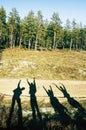SHADOW OF FOUR HAPPY PEOPLE