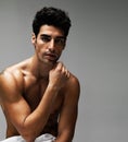 Shirtless Muscular Man Against...