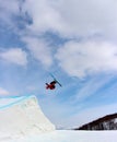 Skier  going off a big jump in hanazono park