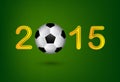 Soccer ball in 2015 digit on green background