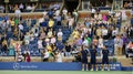 Spectators standing at Arthur Ashe Stadium for American anthem performance during US Open 2014 night session