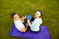 Sports Couple Using Digital Ta...