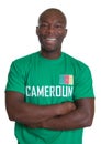 Sports fan from Cameroon with crossed arms
