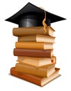 Stack of books with graduation cap big Royalty Free Stock Image