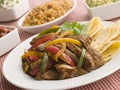 Steak Fajitas with Jambalaya Guacamole Salsa