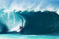 Surfer Kelly Slater Surfing Pipeline in Hawaii