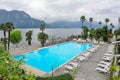 Swimming pool of a grand hotel facing Lake Como in Italy