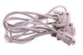 Tangled cords with com port two wires behind on a white background Stock Photos