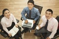 Team Of Three People Working O...