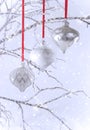 Three Silver Christmas Ornaments with Snow