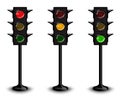 Three traffic lights black with different glowing Stock Photography