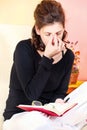 Tired Woman Of Reading Book