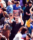 Turkish protester holds a sign during a political demo man in trafalgar square london supports the protesters in istanbul turkey Royalty Free Stock Photography