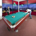Two People Playing Pool