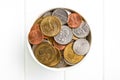 U.S. coins in ceramic bowl