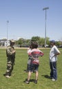 Unidentified US Navy from EOD team with spectators after mine countermeasures demonstration during Fleet Week 2014