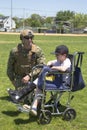 Unidentified US Navy from EOD team with unidentified child after mine countermeasures demonstration during Fleet Week 2014