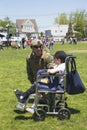 Unidentified US Navy from EOD team with unidentified child after mine countermeasures demonstration during Fleet Week 2014