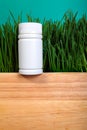 Vial On Grass Background