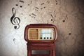 Vintage music notes with old radio